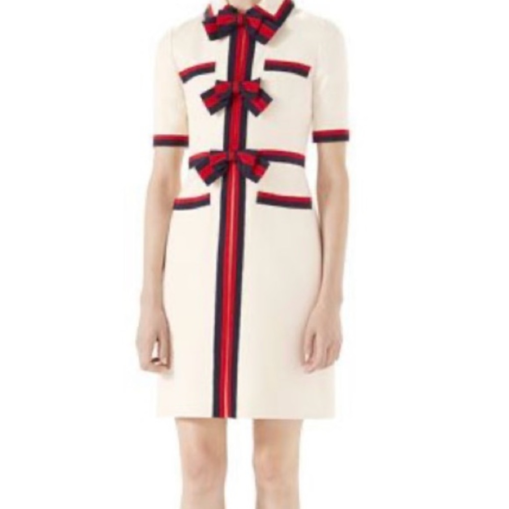 Elegant Cream Dress with Red and Black Accents